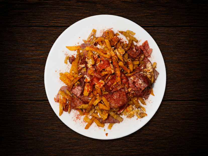 Huevos rotos con jamón y Bacon